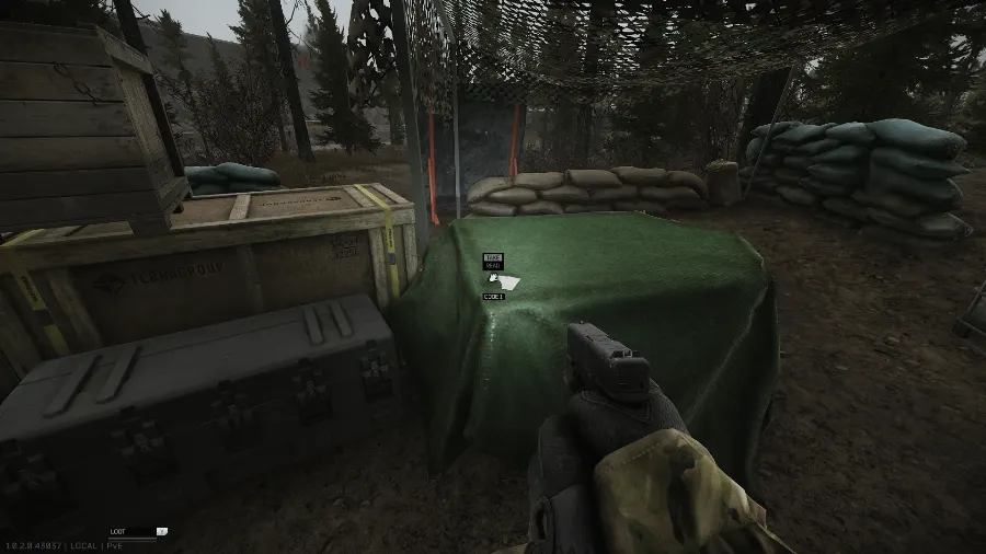 First piece of code note on the pallet with the green cloth