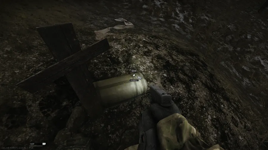 Moreman's dogtag on the sleeping bag next to the cross