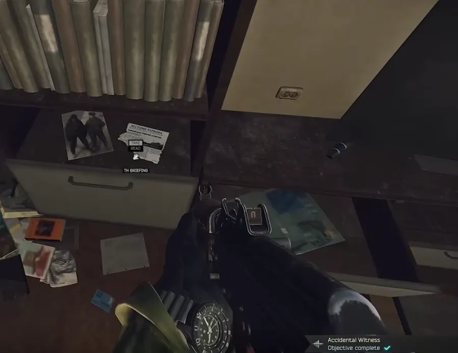 First spawn in the bottom compartment of the shelf next to the TV